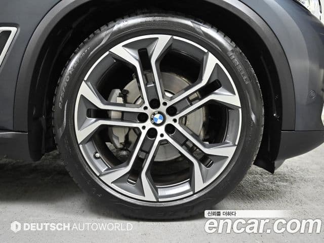 BMW X5 2022 — ფოტო 4/20