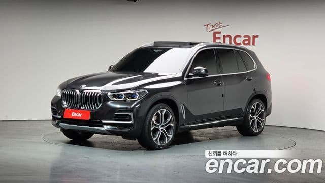 BMW X5 2022 — Фото 1/20