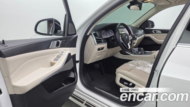 BMW X7 2021 — ფოტო 10/20