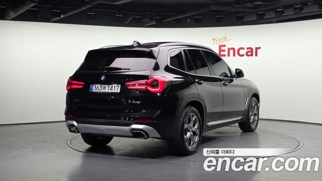 BMW X3 2022 — ფოტო 1/20