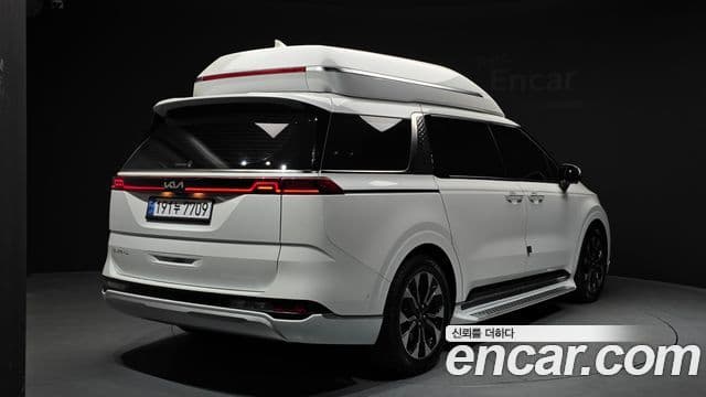 Kia Carnival 2023 — ფოტო 4/33