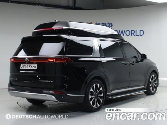 Kia Carnival 2021 — ფოტო 1/20