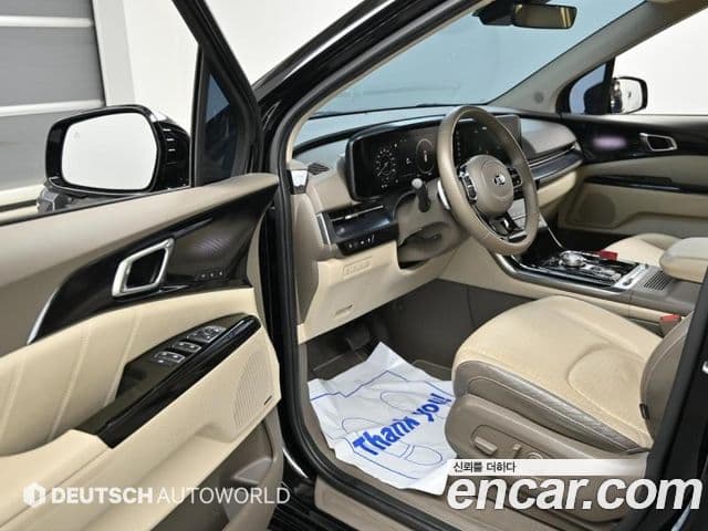 Kia Carnival 2021 — ფოტო 8/20