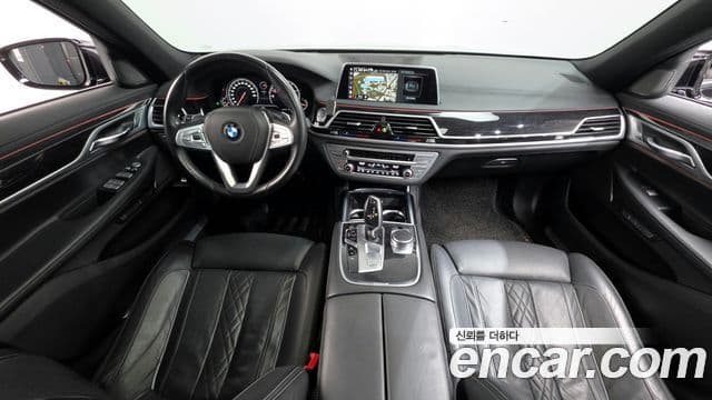BMW 7 Series 2018 — ფოტო 16/20
