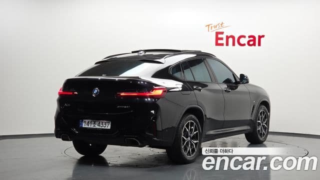 BMW X4 2022 — Фото 2/20