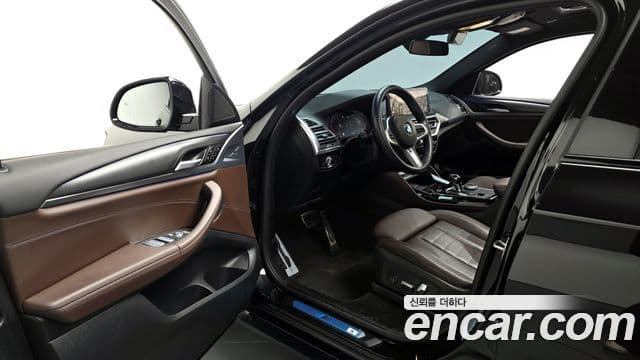 BMW X4 2022 — Фото 10/20
