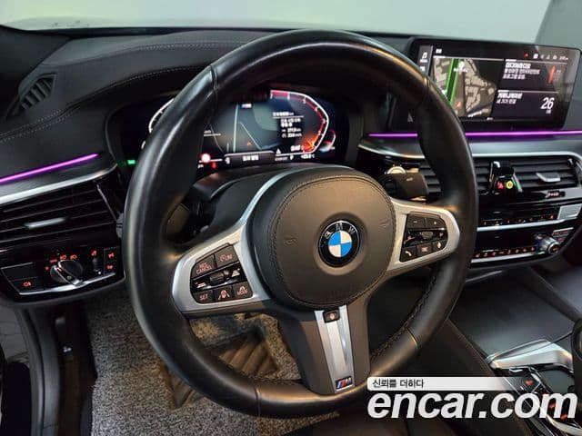BMW 5 Series 2023 — ფოტო 8/20