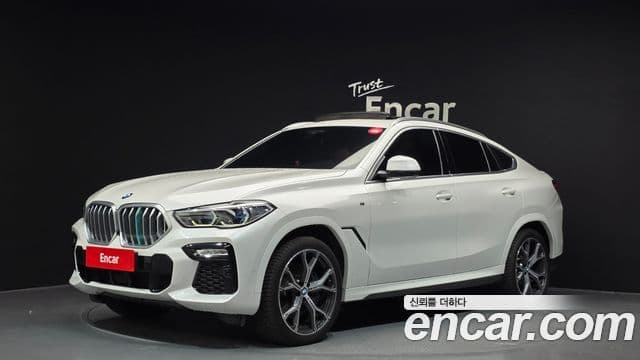 BMW X6 2021 — Фото 1/20