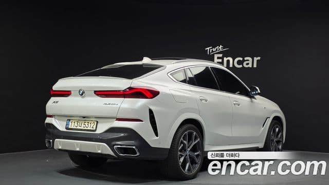BMW X6 2021 — Фото 2/20