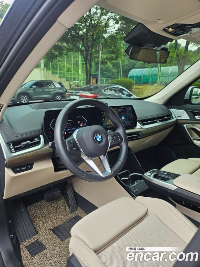BMW X1 2023 — ფოტო 10/20