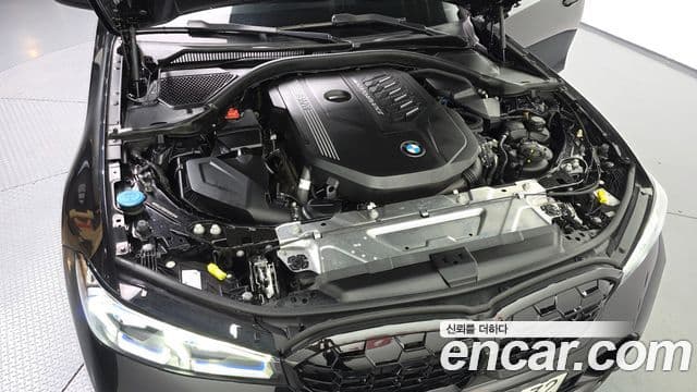 BMW 3 Series 2023 — ფოტო 6/20