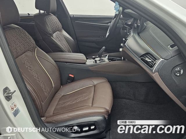 BMW 5 Series 2023 — Фото 11/20