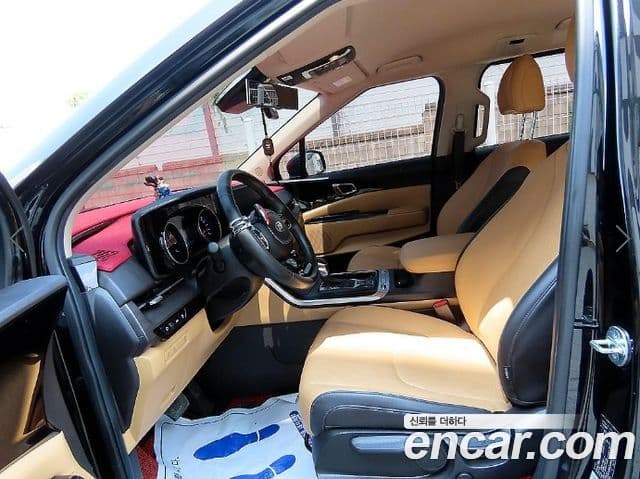 Kia Carnival 2021 — ფოტო 4/20