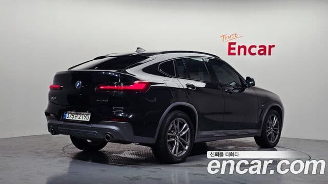 BMW X4 2021 — Фото 2/20