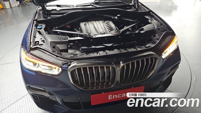 BMW X5 2019 — ფოტო 6/20