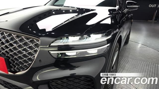 Genesis GV70 2021 — ფოტო 24/34