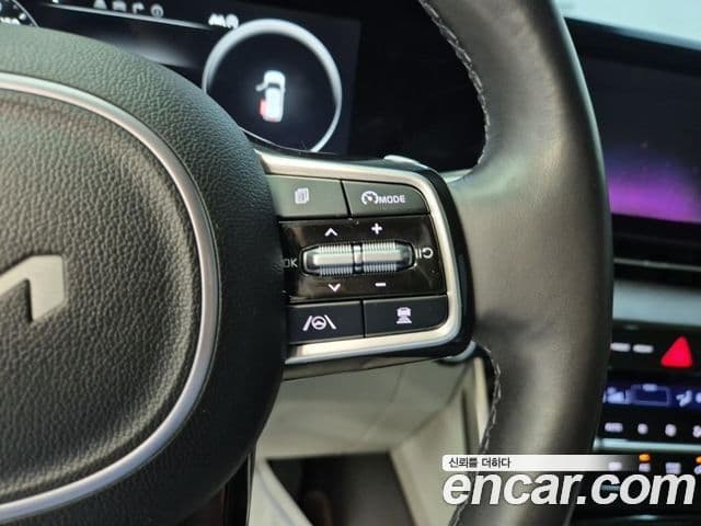 Kia Carnival 2023 — Фото 18/19