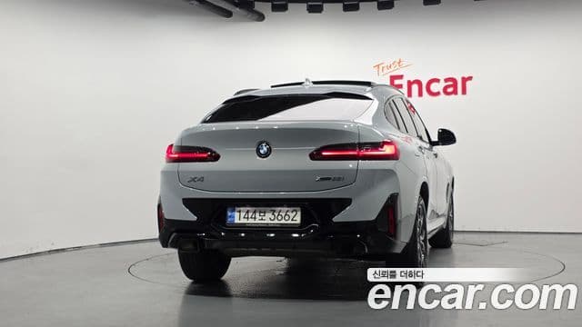 BMW X4 2022 — ფოტო 4/20