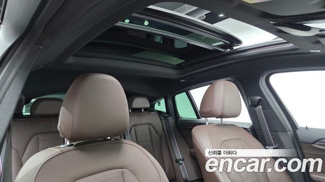 BMW X4 2022 — ფოტო 13/20