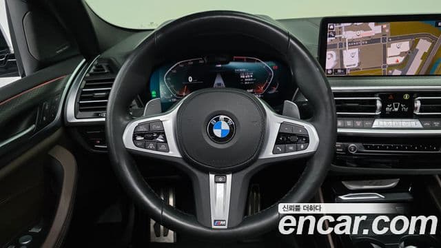 BMW X4 2022 — ფოტო 15/20