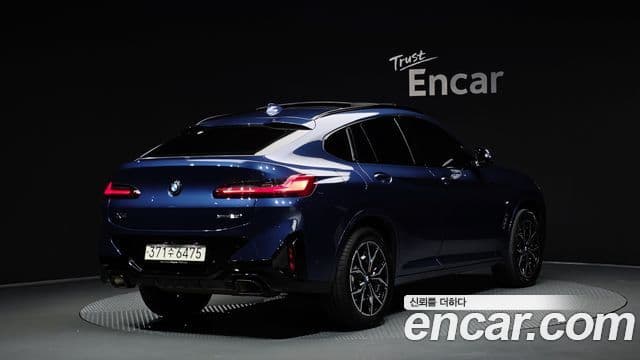 BMW X4 2023 — Фото 2/20