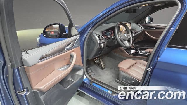 BMW X4 2023 — Фото 10/20