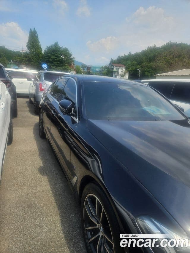 BMW 5 Series 2021 — ფოტო 14/16