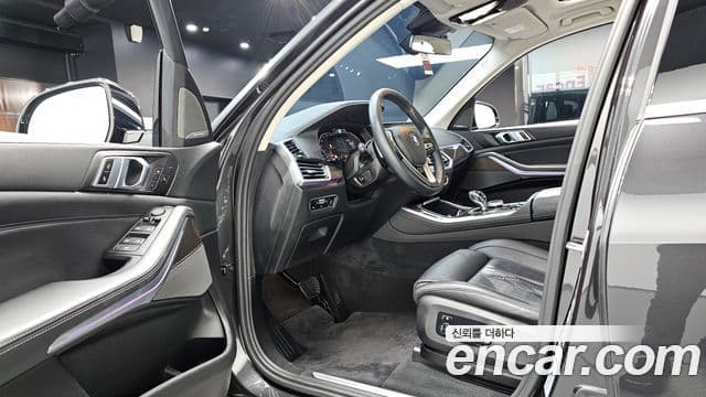 BMW X5 2023 — ფოტო 10/20