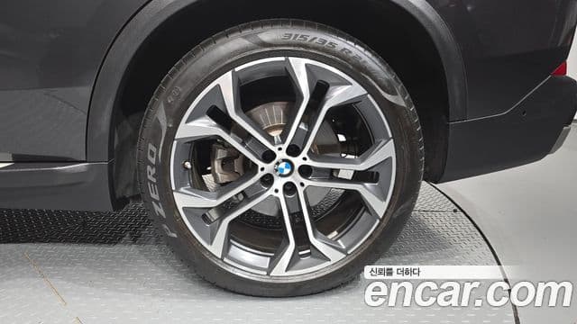 BMW X5 2023 — ფოტო 32/36