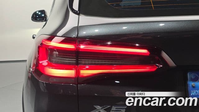 BMW X5 2023 — ფოტო 28/36