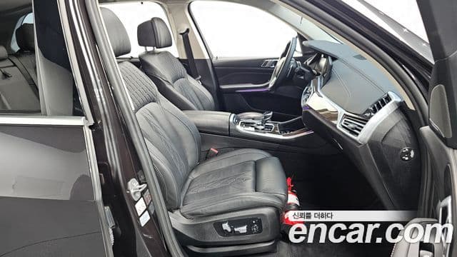 BMW X5 2023 — ფოტო 6/36