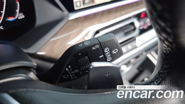 BMW X5 2023 — ფოტო 16/36