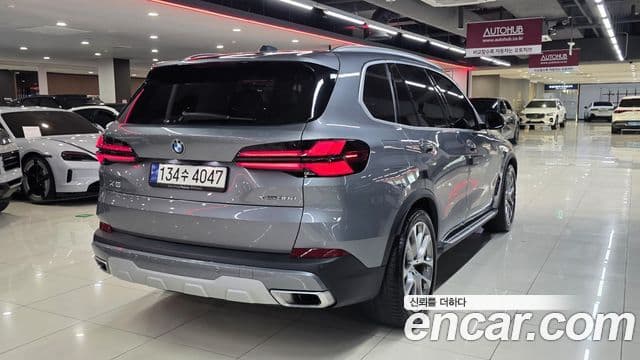 BMW X5 2023 — ფოტო 4/20