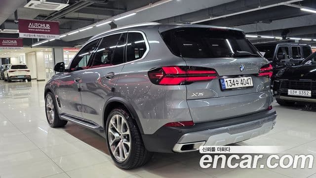 BMW X5 2023 — ფოტო 10/20