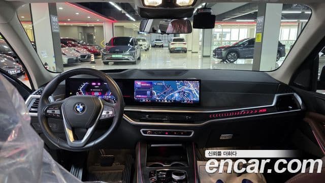 BMW X5 2023 — ფოტო 7/20