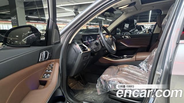 BMW X5 2023 — ფოტო 8/20