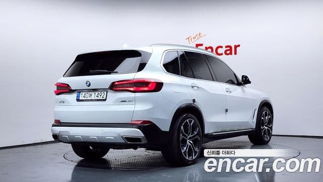 BMW X5 2021 — ფოტო 1/20