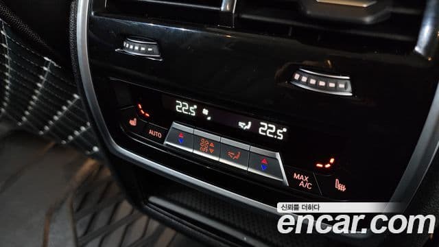 BMW X5 2021 — ფოტო 16/20