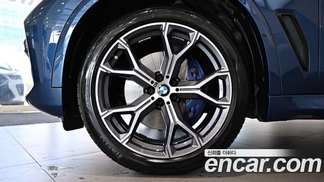 BMW X5 2023 — ფოტო 4/20