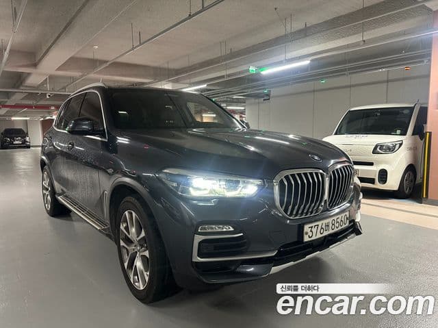 BMW X5 2020 — ფოტო 1/14
