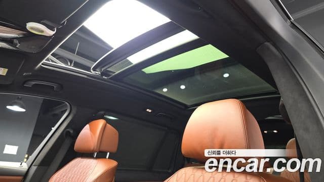 BMW X7 2023 — ფოტო 18/20