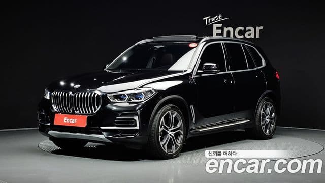 BMW X5 2023 — Фото 1/20