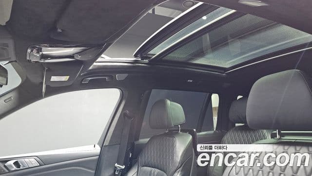 BMW X7 2021 — ფოტო 19/20