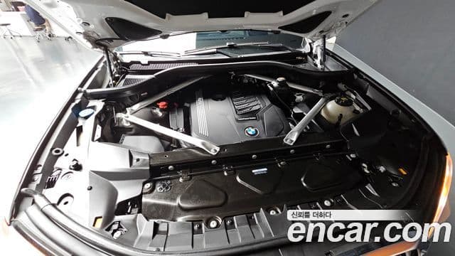 BMW X7 2022 — ფოტო 6/20