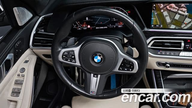 BMW X7 2022 — ფოტო 13/20
