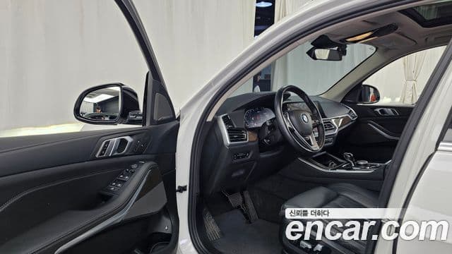 BMW X5 2021 — ფოტო 10/20