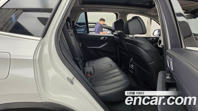 BMW X5 2021 — ფოტო 18/20
