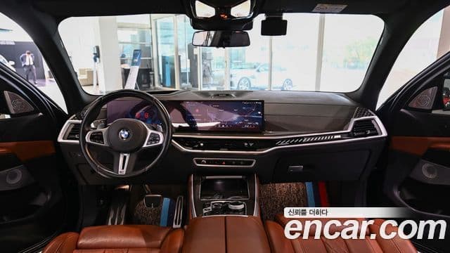 BMW X5 2023 — ფოტო 7/20