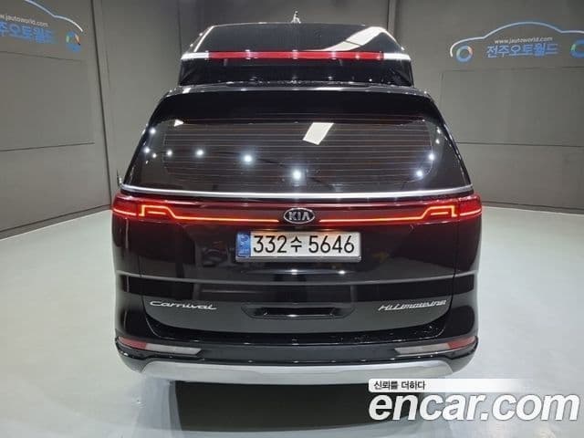 Kia Carnival 2021 — ფოტო 4/20
