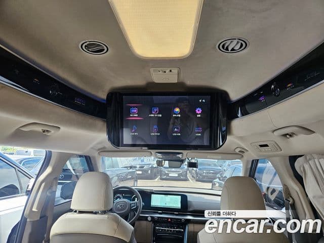 Kia Carnival 2021 — ფოტო 19/20